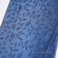 Prix ​​pas cher plaidoir teint bleu 100% polyester satin jacquard rideau tissu pour grosse